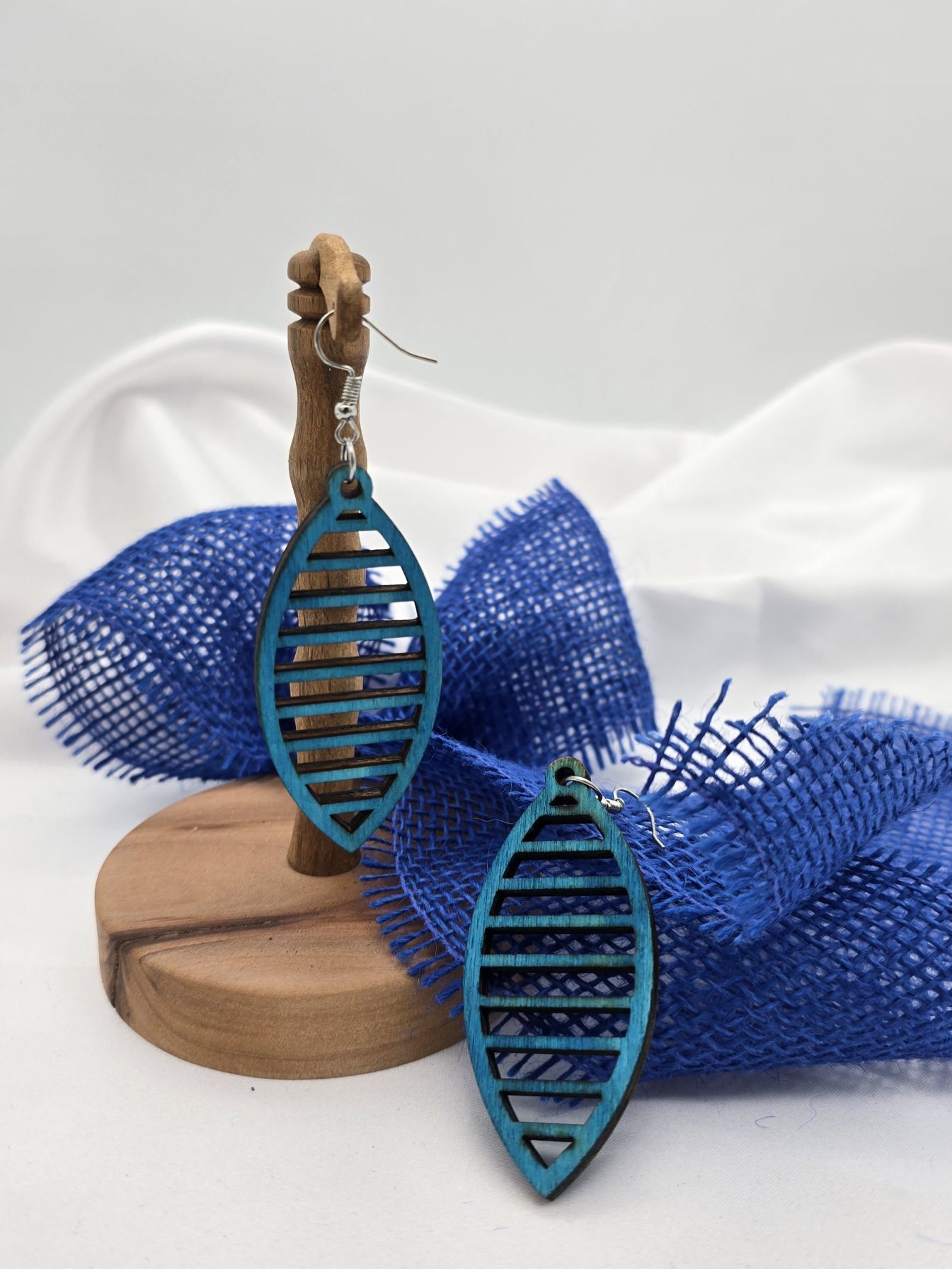 Linsenform Linien türkis